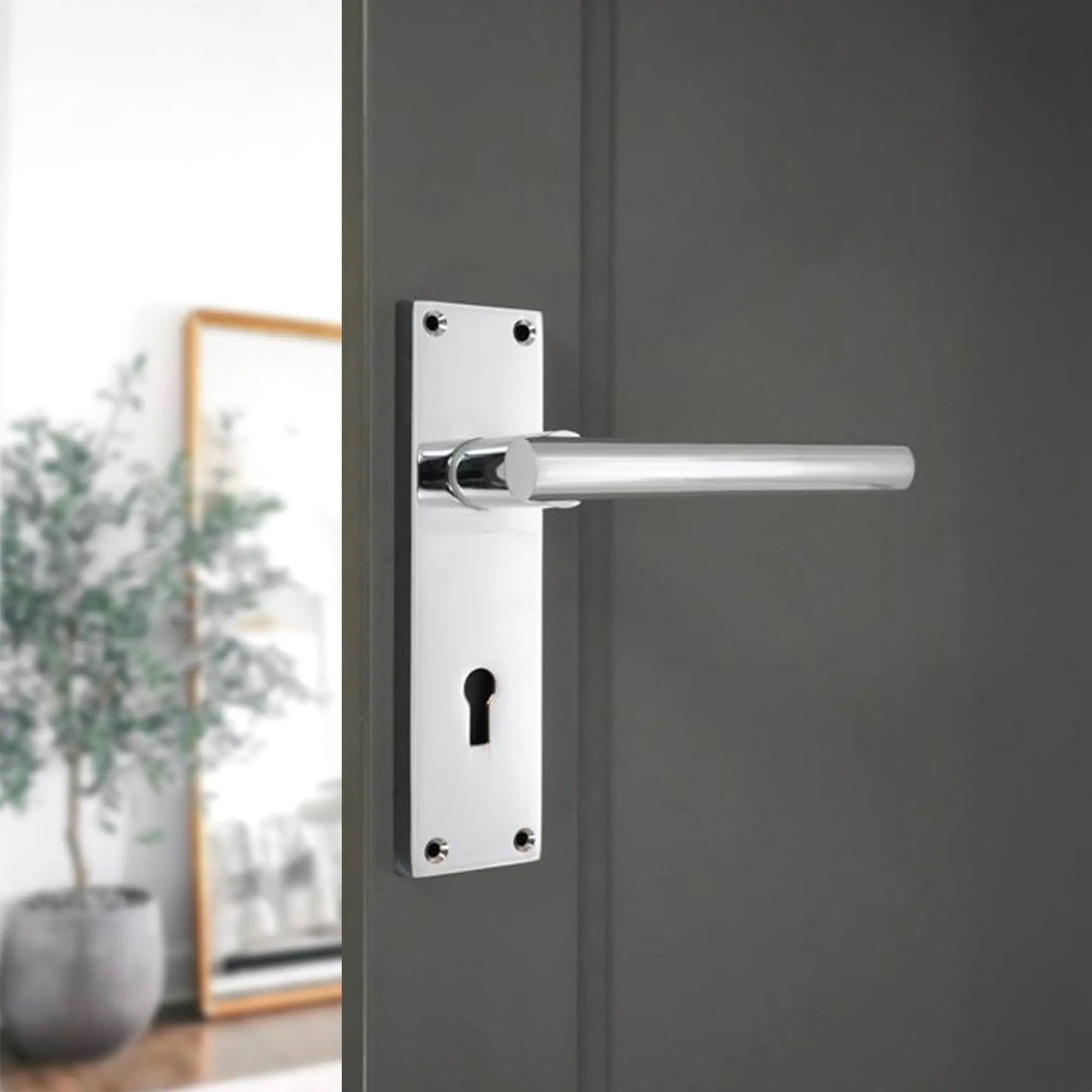 Jura Lever on Backplate Lock Polished Chrome Spira