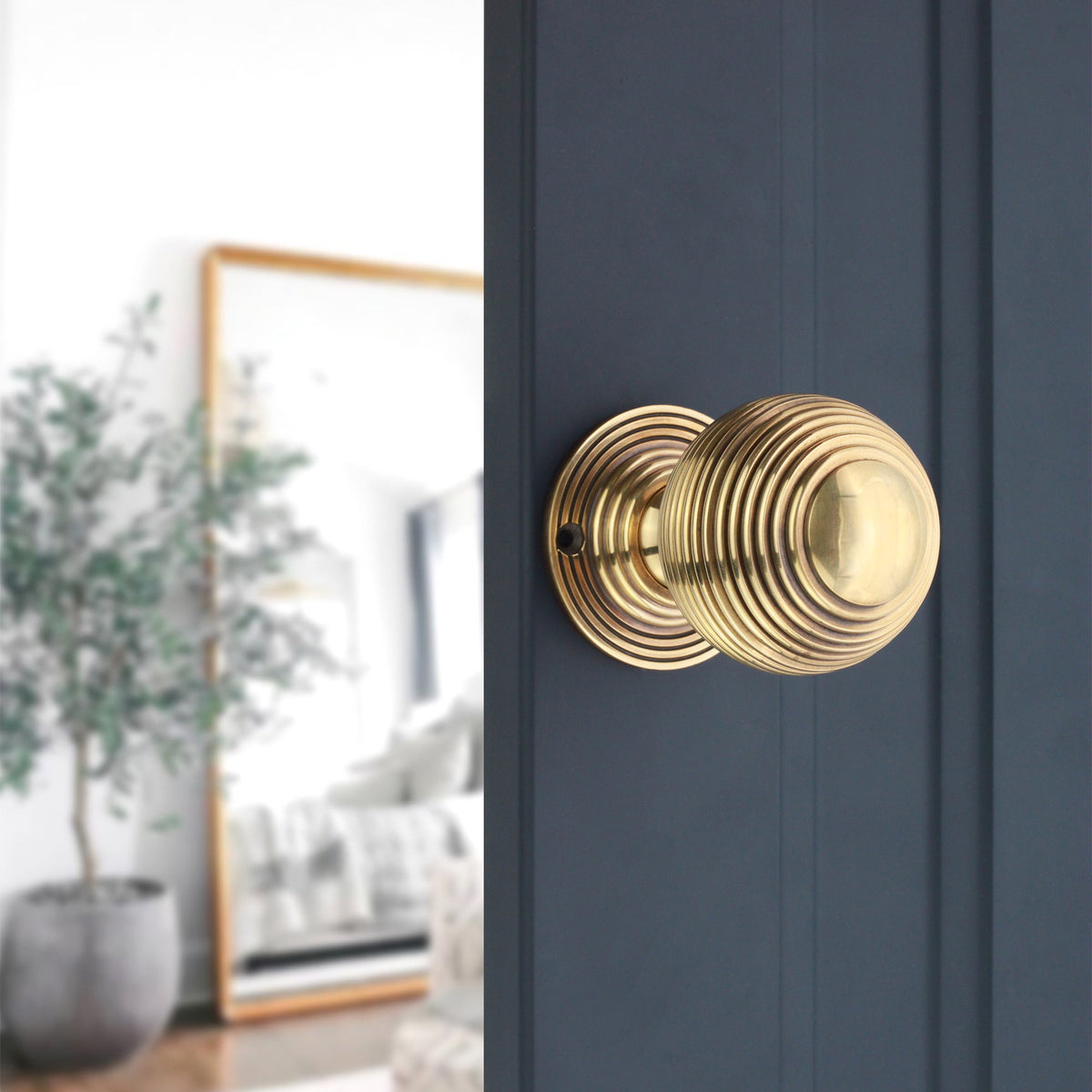 Reeded 60mm Rim/Mortice Door Knob Aged Brass