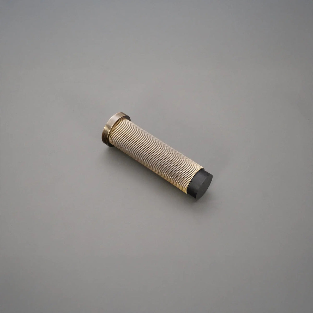 Connaught Linear Door Stopper Antique Brass Spira